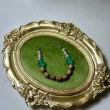 Load image into Gallery viewer, Still Water Bracelet | Agarwood Bracelet | Nepalese Glass Beads | Handmade Artisan Jewelry | Zen Inspired Bracelet