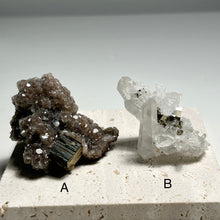 Load image into Gallery viewer, Clear Quartz Cluster with Pyrite Inclusions/Brown Calcite Cluster with Pyrite
