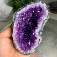 Load image into Gallery viewer, High quality - Uruguay amethyst geode with moss agate banding on skin
