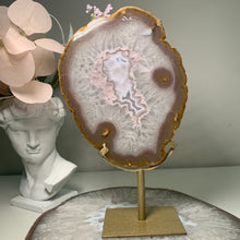 Load image into Gallery viewer, Rare - Agate slice in stand with nice pink druzy pattern in center
