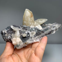 Load image into Gallery viewer, Self - stand Dogtooth calcite with fluorite on matrix
