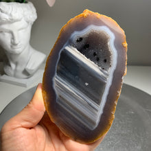 Load image into Gallery viewer, Top quality-  Agate geode pair from Brazil with sparkling druzy and nice banding
