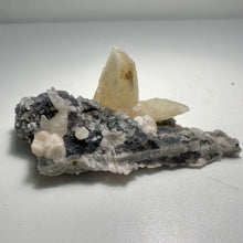 Load image into Gallery viewer, Self - stand Dogtooth calcite with fluorite on matrix
