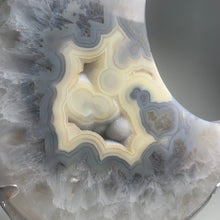 Load image into Gallery viewer, XL Brazilian Agate Moon on Stand | Cream &amp; Grey Druzy Crystal Decor | Large Agate Slice Sculpture | Luxury Home Styling Piece
