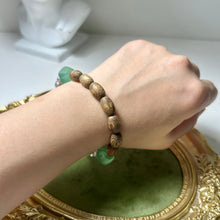 Load image into Gallery viewer, Still Water Bracelet | Agarwood Bracelet | Nepalese Glass Beads | Handmade Artisan Jewelry | Zen Inspired Bracelet

